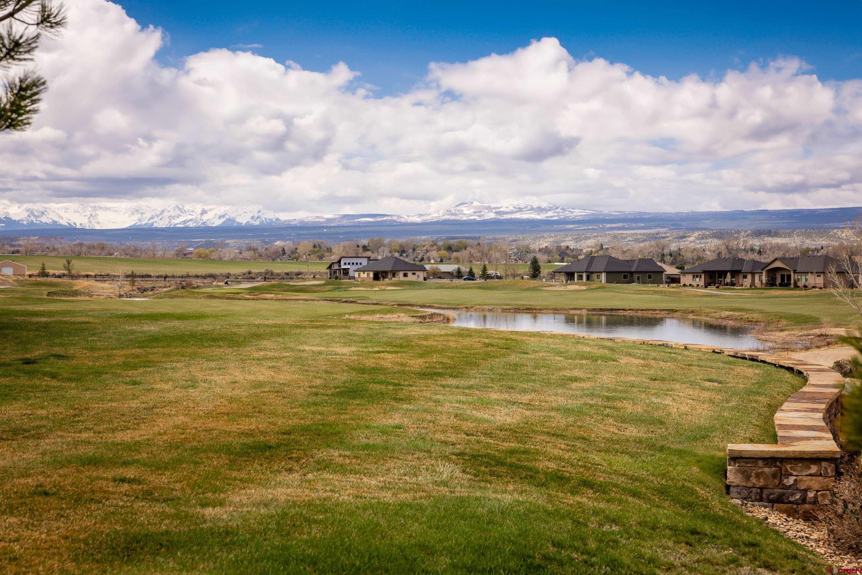 Lot 1928 Sleeping Bear Road Montrose, CO 81401 - Photo 10 of 12 a view of an ocean and a building