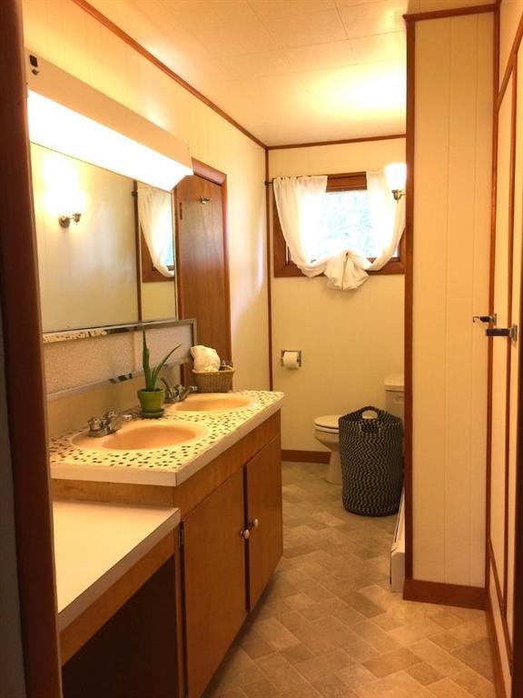 202 Little Deer Isle Road Little Deer Isle, ME 04650 - Photo 25 of 35 One of the bathrooms in the main house