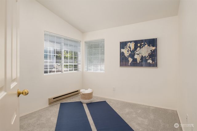 a view of room with wooden floor