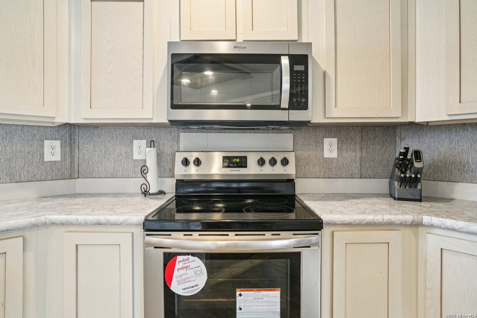 4045 Jakes Colony Road Seguin, TX 78155 - Photo 12 of 36 a stove top oven sitting inside of a kitchen