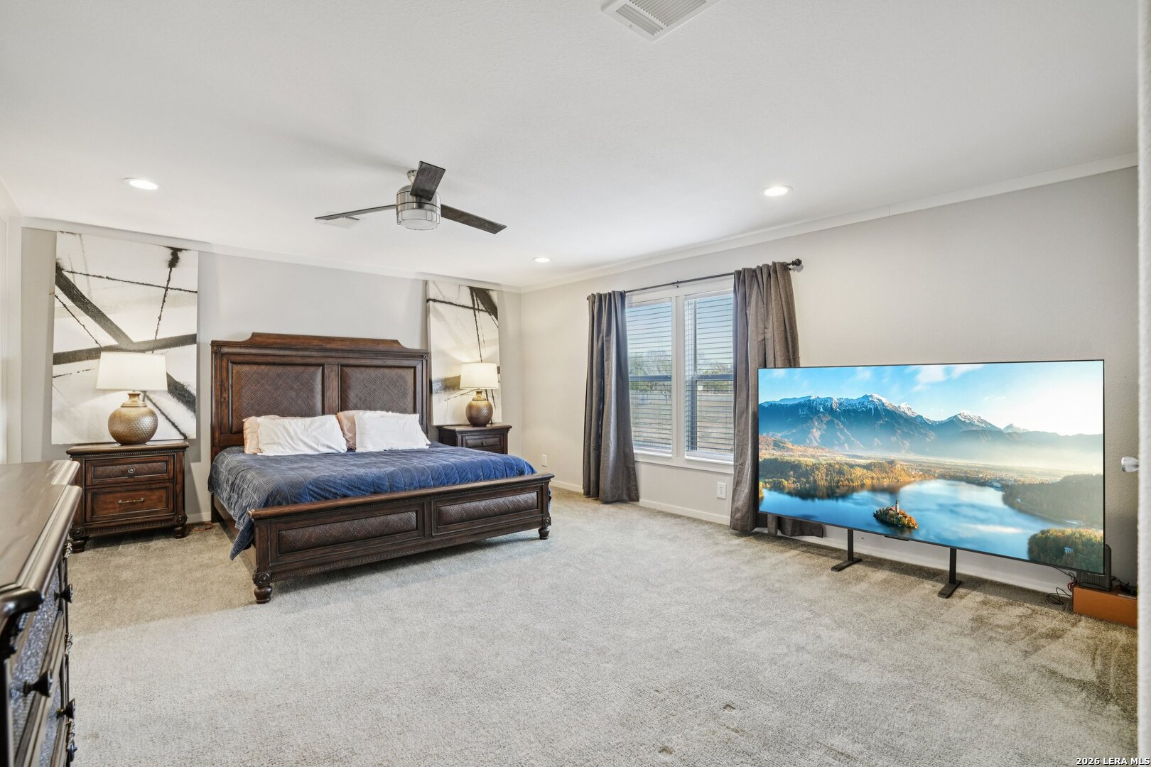 4045 Jakes Colony Road Seguin, TX 78155 - Photo 14 of 36 a bedroom with bed and a chandelier