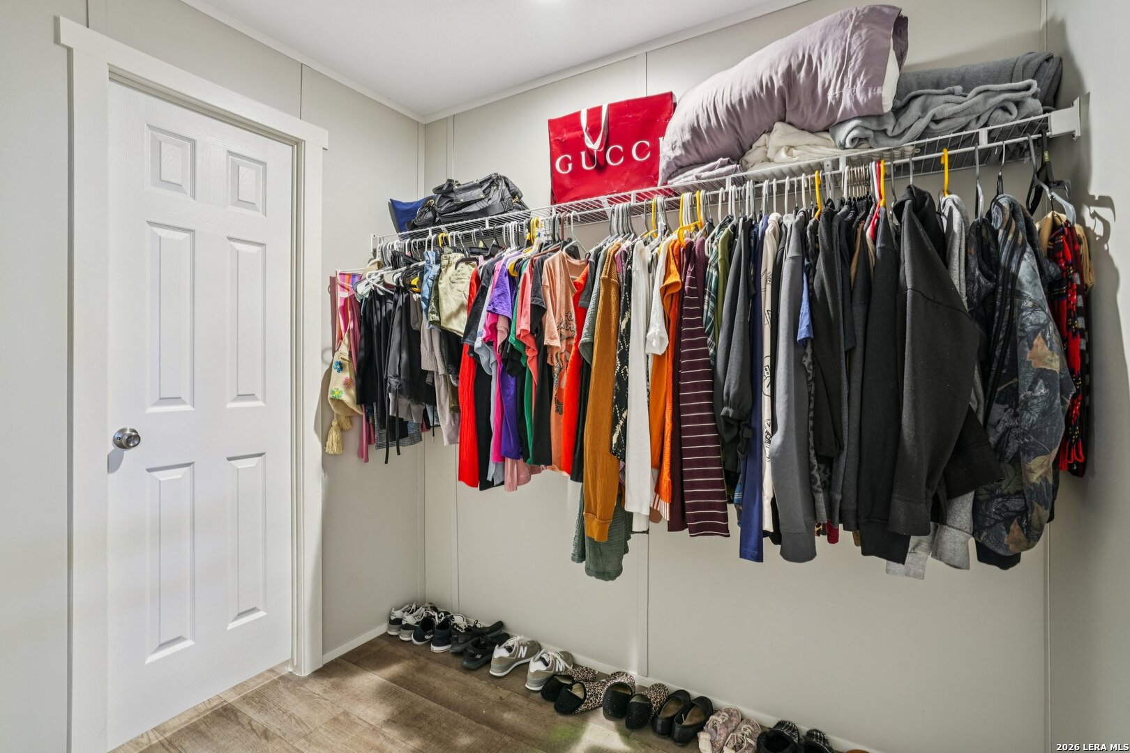 4045 Jakes Colony Road Seguin, TX 78155 - Photo 22 of 36 a view of walk in closet with clothes