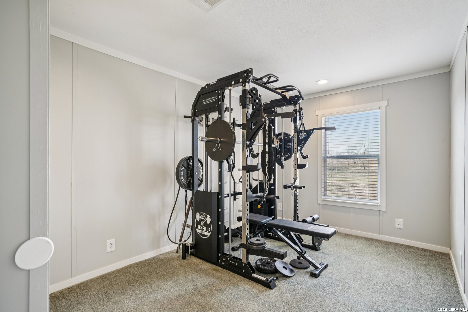 4045 Jakes Colony Road Seguin, TX 78155 - Photo 27 of 36 a view of a room with gym equipment