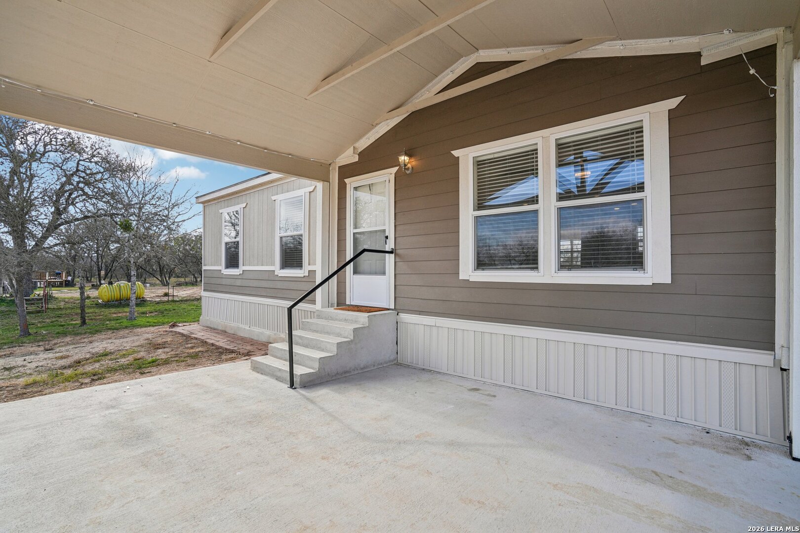 4045 Jakes Colony Road Seguin, TX 78155 - Photo 3 of 36 a view of a house with a yard