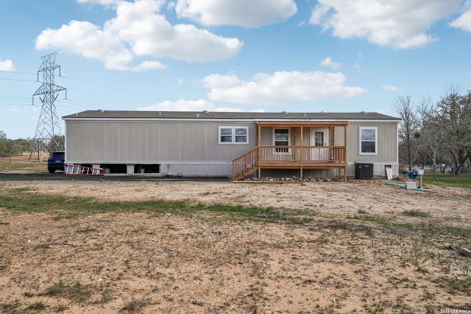 4045 Jakes Colony Road Seguin, TX 78155 - Photo 34 of 36 a view of a house with a yard