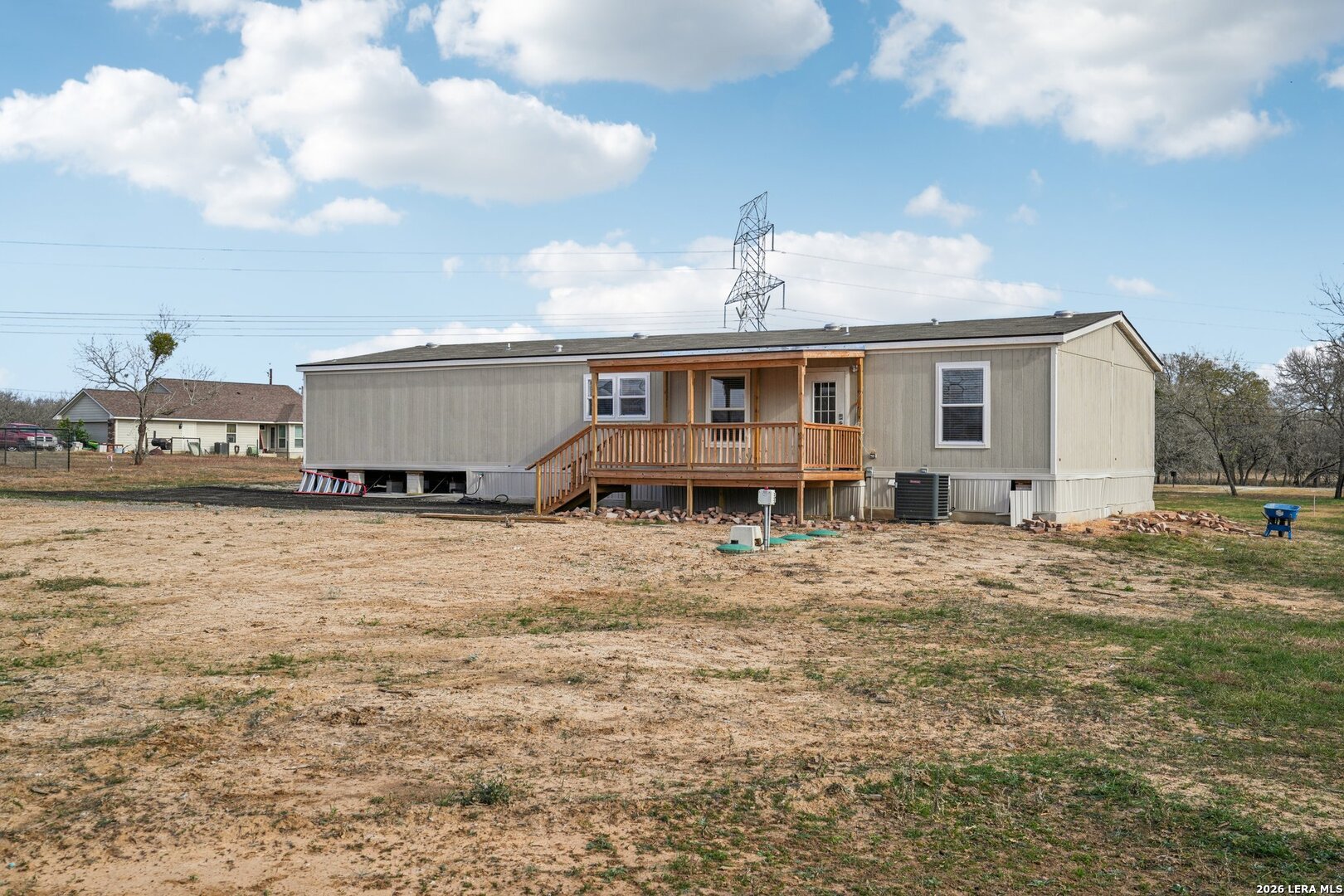 4045 Jakes Colony Road Seguin, TX 78155 - Photo 35 of 36 a view of a house with backyard and sitting area