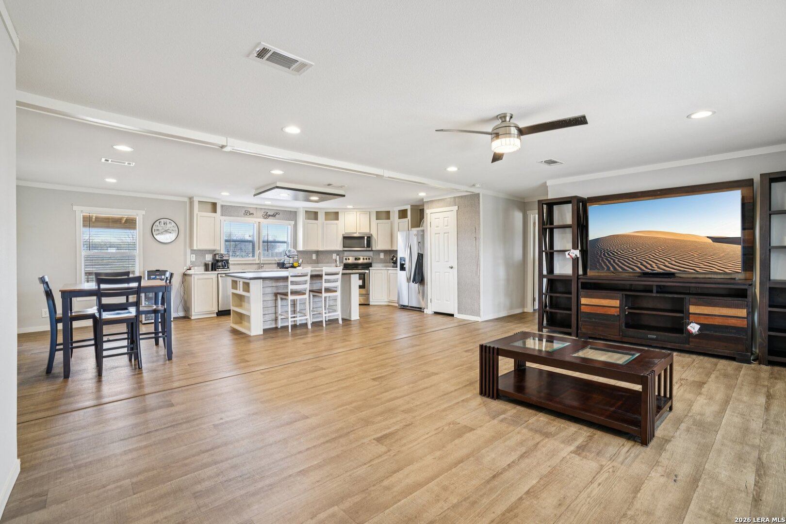 4045 Jakes Colony Road Seguin, TX 78155 - Photo 6 of 36 a living room with furniture and wooden floor