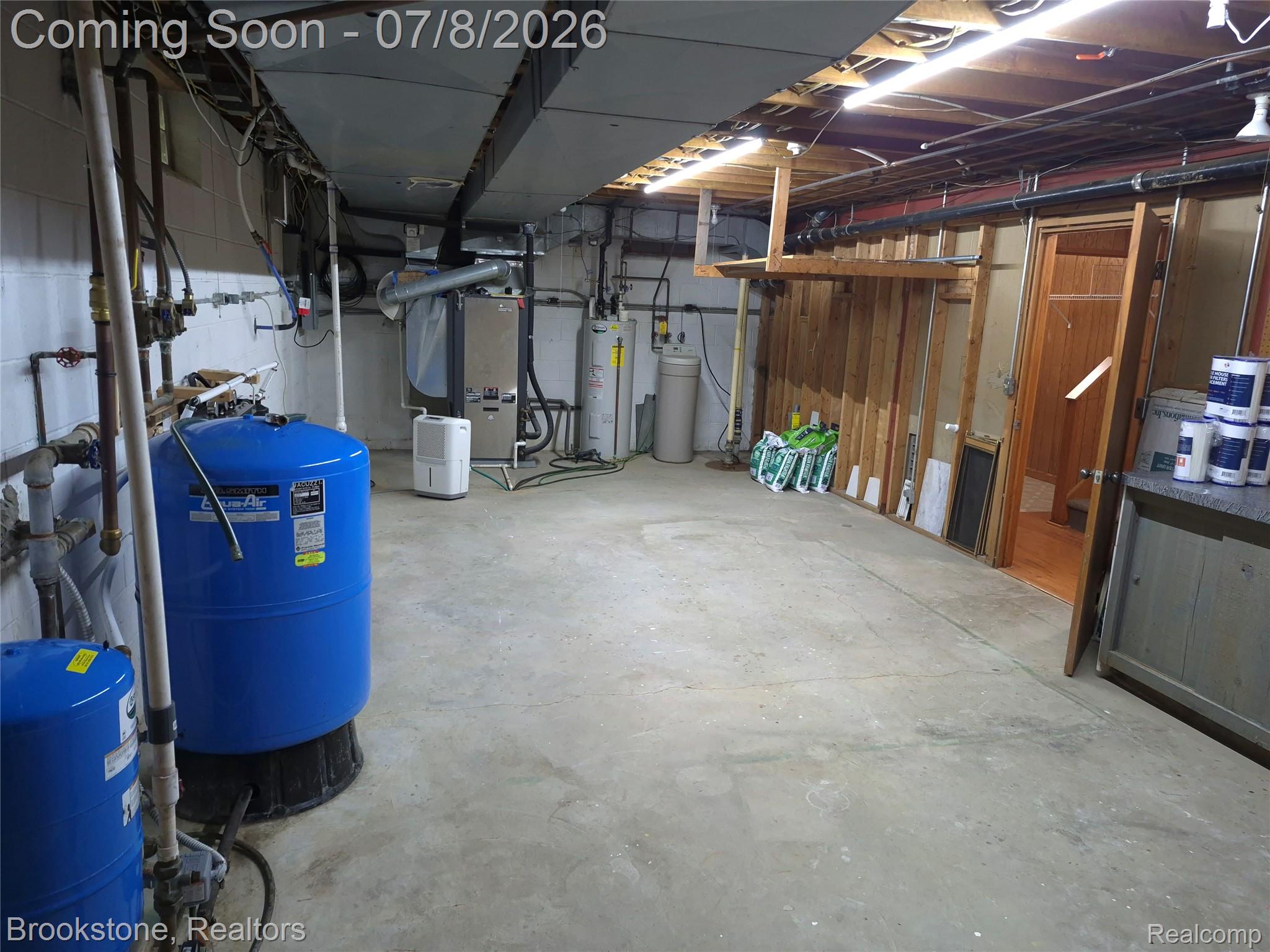 4140 South Henderson Road Davison, MI 48423 - Photo 77 of 98 Expansive unfinished basement featuring concrete flooring and exposed structural elements