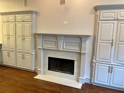 a living room with a fireplace