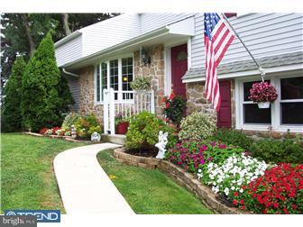 18 Red Lion Road Huntingdon Valley, PA 19006 - Photo 3 of 12 a front view of a house with a yard