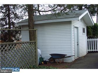 18 Red Lion Road Huntingdon Valley, PA 19006 - Photo 5 of 12 a backyard of a house with table and chairs