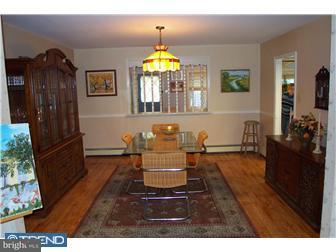 18 Red Lion Road Huntingdon Valley, PA 19006 - Photo 8 of 12 a living room with furniture and a chandelier