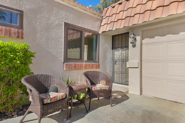 a building outdoor space with patio furniture