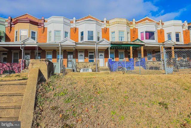 a view of building with large windows