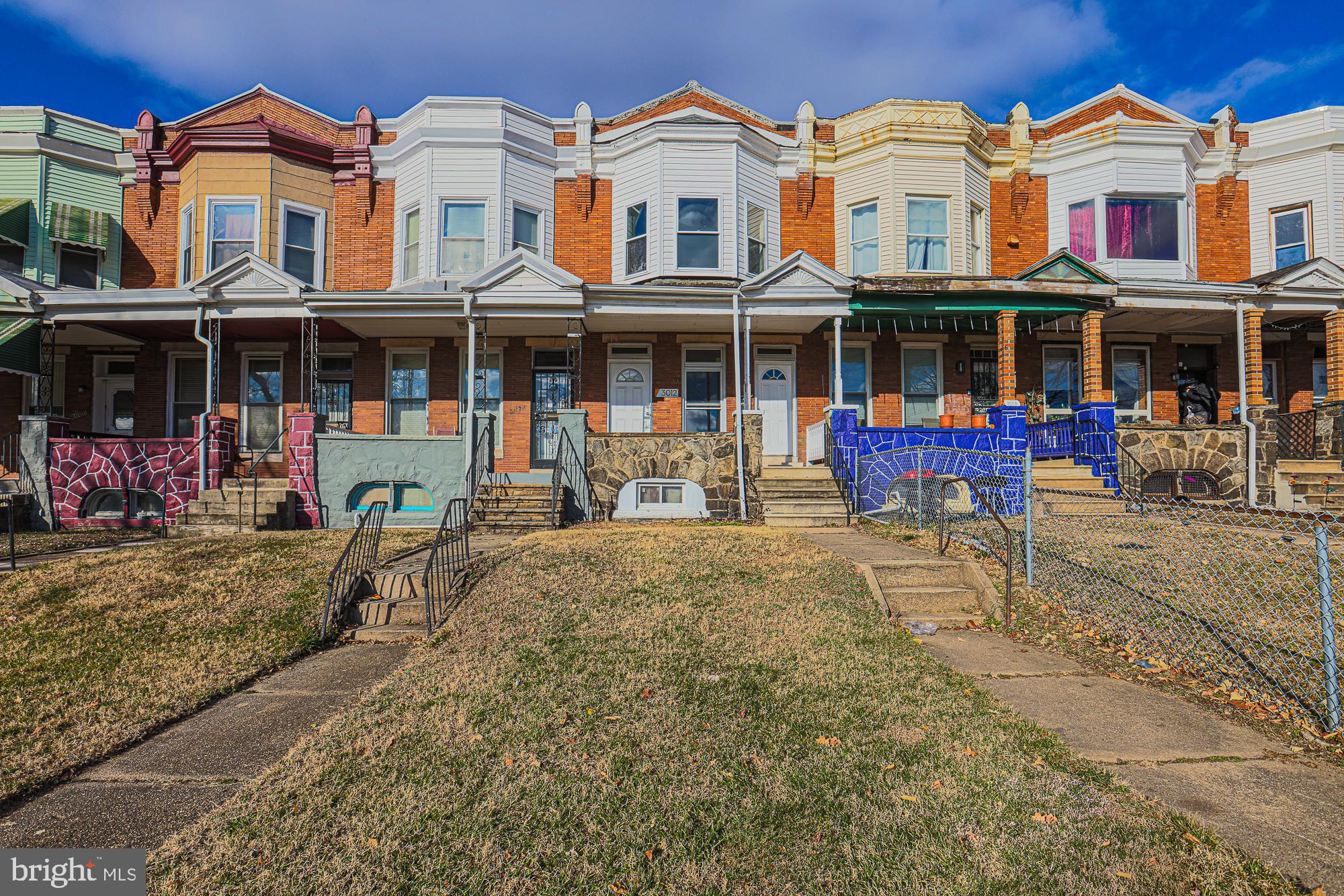 3012 Harford Road Baltimore, MD 21218 - Photo 3 of 42 a front view of a building with many windows