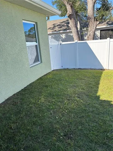 a view of backyard with hardwood