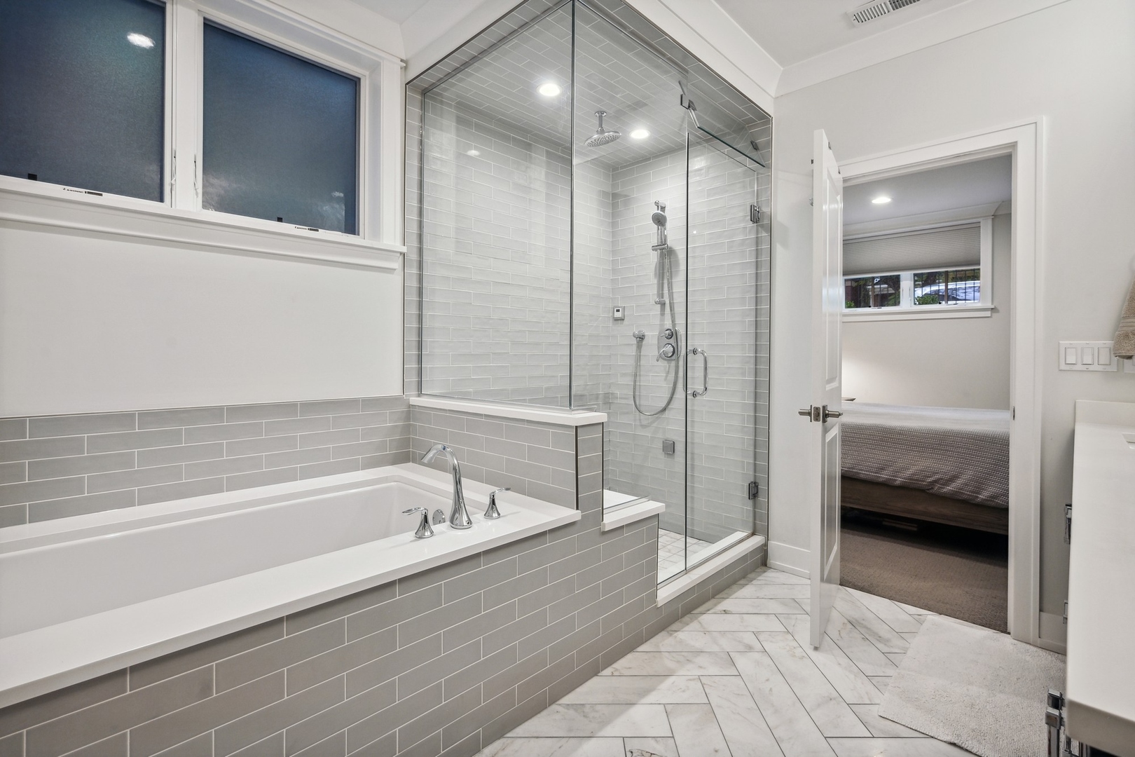 1341 West George Street, Unit 1 Chicago, IL 60657 - Photo 15 of 24 a bathroom with a tub shower and sink