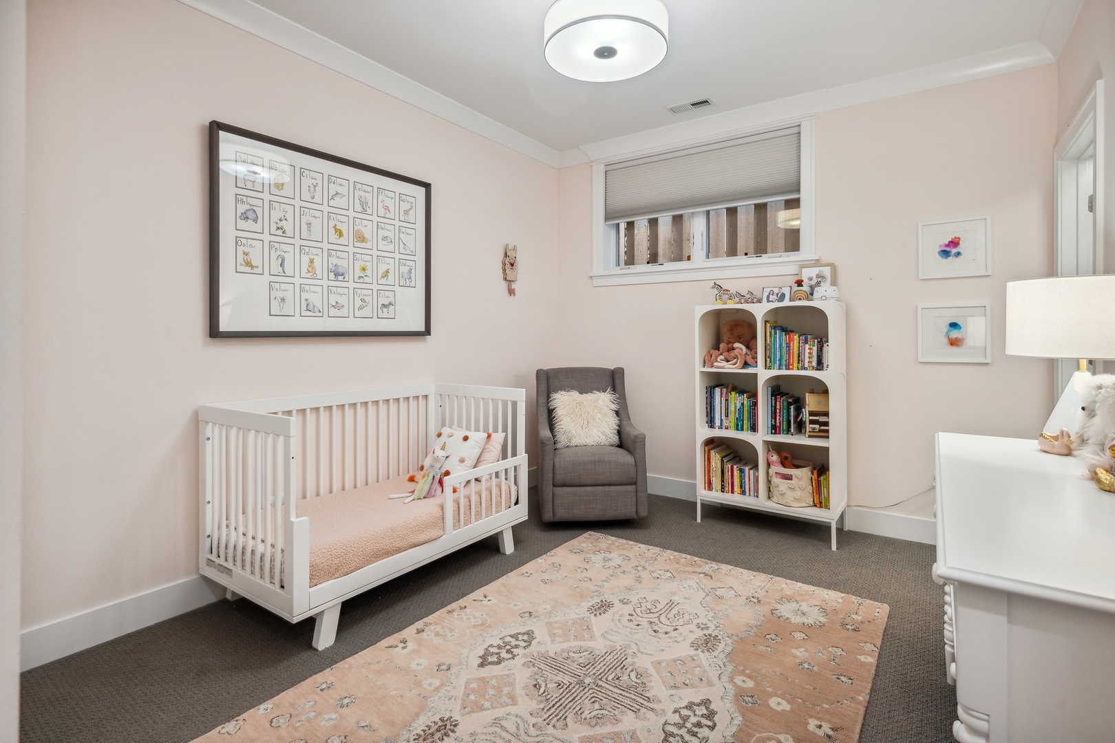 1341 West George Street, Unit 1 Chicago, IL 60657 - Photo 19 of 24 a living room with furniture and baby crib