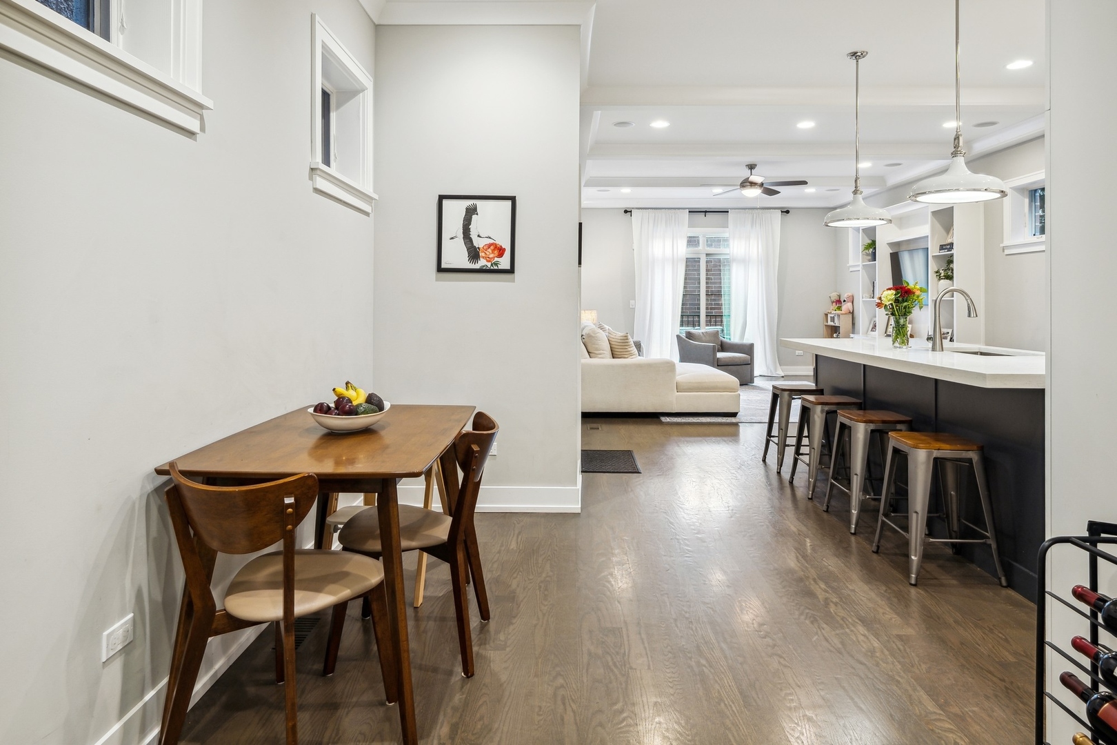 1341 West George Street, Unit 1 Chicago, IL 60657 - Photo 6 of 24 a view of a dining room with furniture and wooden floor