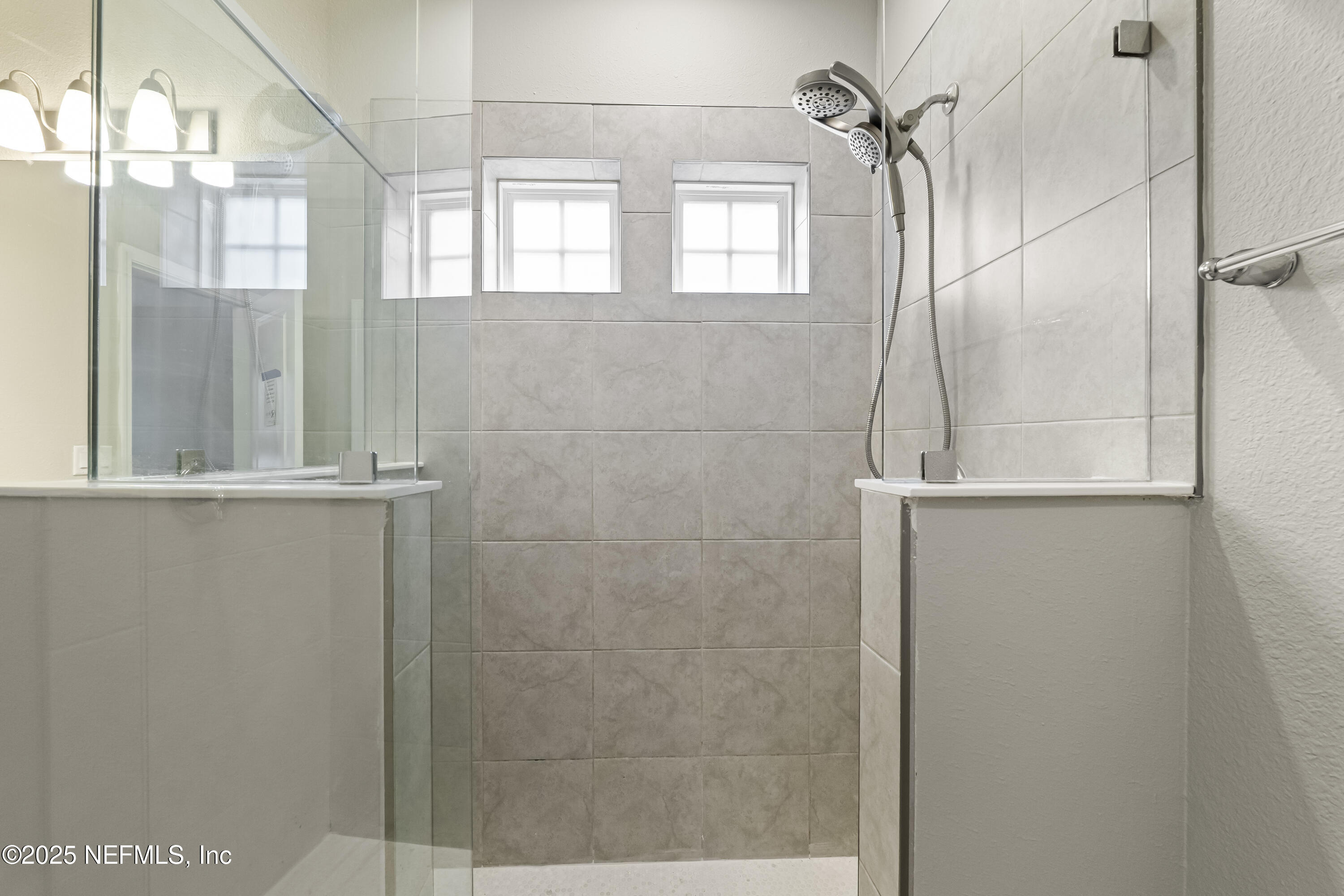2113 Hawkeye Place Fleming Island, FL 32003 - Photo 18 of 30 a bathroom with a shower