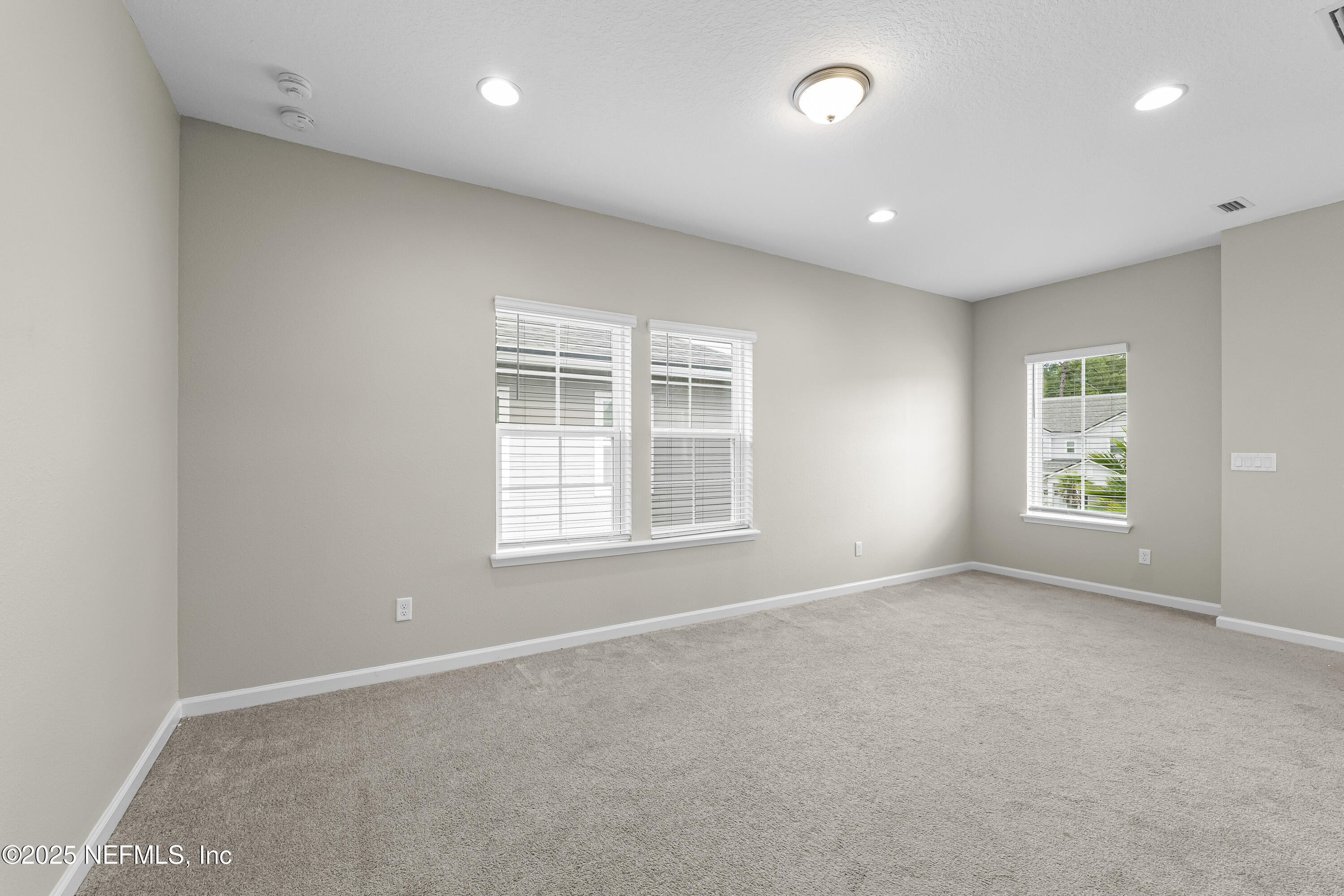 2113 Hawkeye Place Fleming Island, FL 32003 - Photo 20 of 30 an empty room with windows