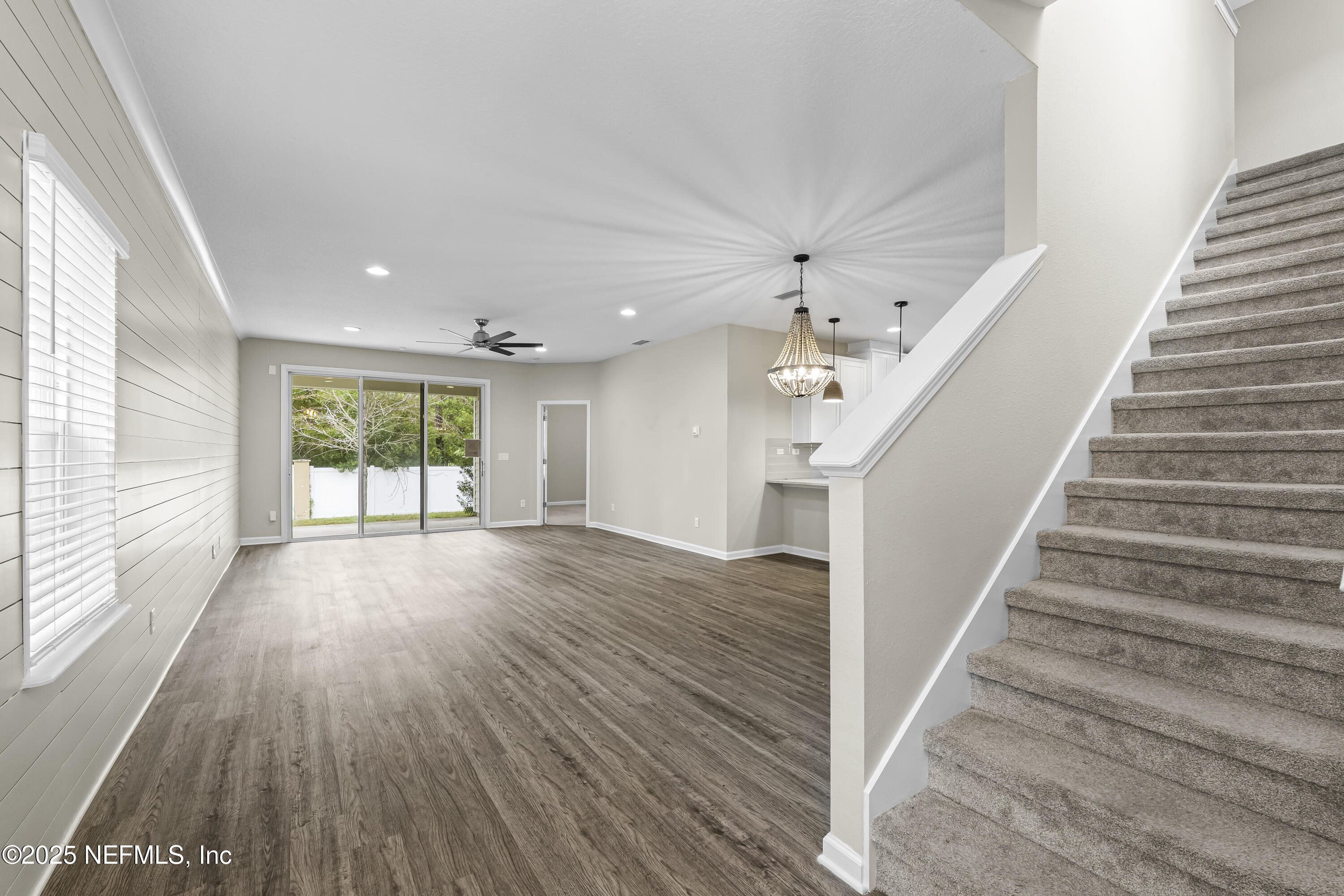 2113 Hawkeye Place Fleming Island, FL 32003 - Photo 2 of 30 a view of entryway and hall with wooden floor