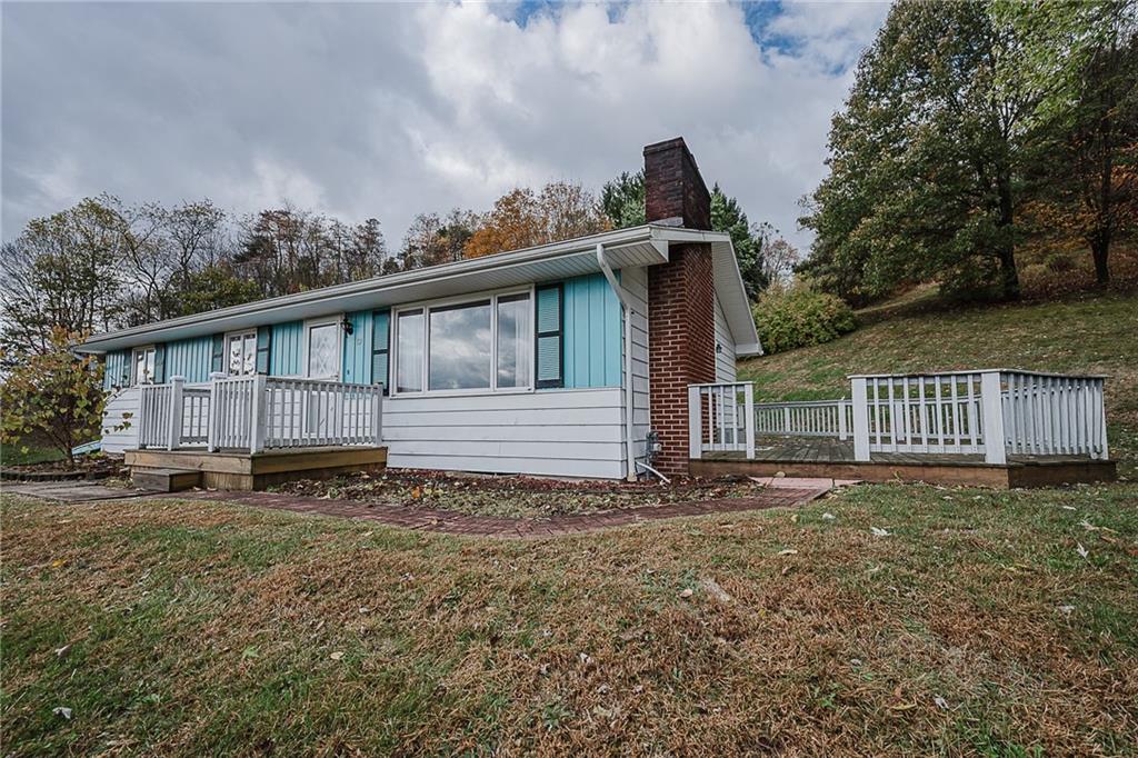 89 Marcoline Road Home, PA 15747 - Photo 1 of 47 a view of a house with backyard and garden