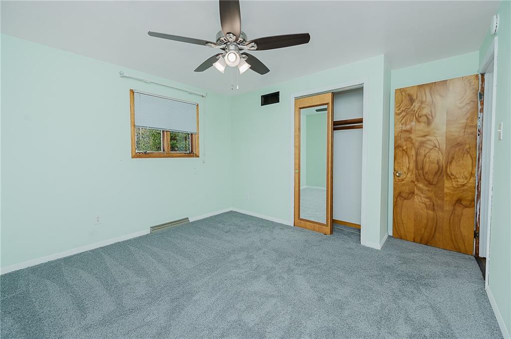 89 Marcoline Road Home, PA 15747 - Photo 19 of 47 a view of an empty room with a fan
