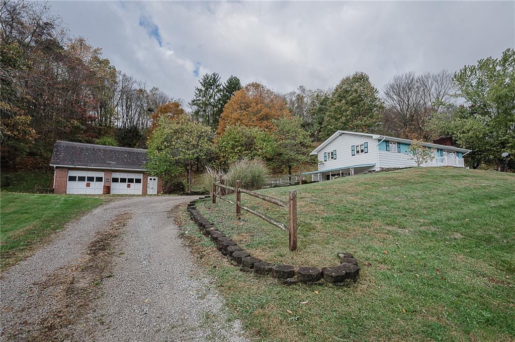 89 Marcoline Road Home, PA 15747 - Photo 2 of 47 a view of a house with a yard