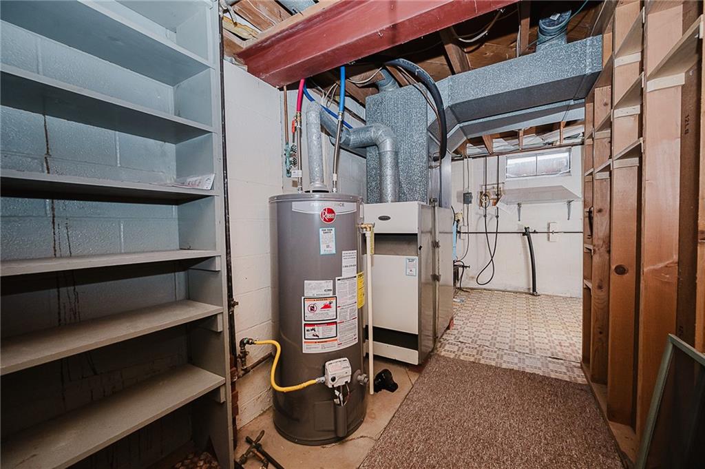 89 Marcoline Road Home, PA 15747 - Photo 28 of 47 a utility room with dryer and washer