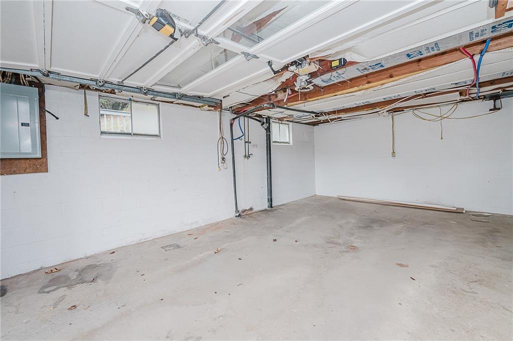 89 Marcoline Road Home, PA 15747 - Photo 30 of 47 a view of a room with wooden walls