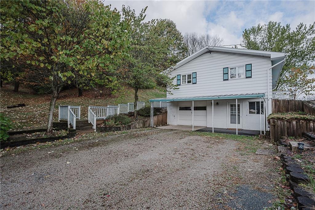 89 Marcoline Road Home, PA 15747 - Photo 39 of 47 a view of a house with backyard and sitting area
