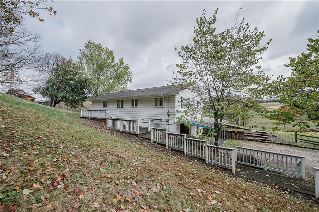 89 Marcoline Road Home, PA 15747 - Photo 41 of 47 a view of a house with a yard