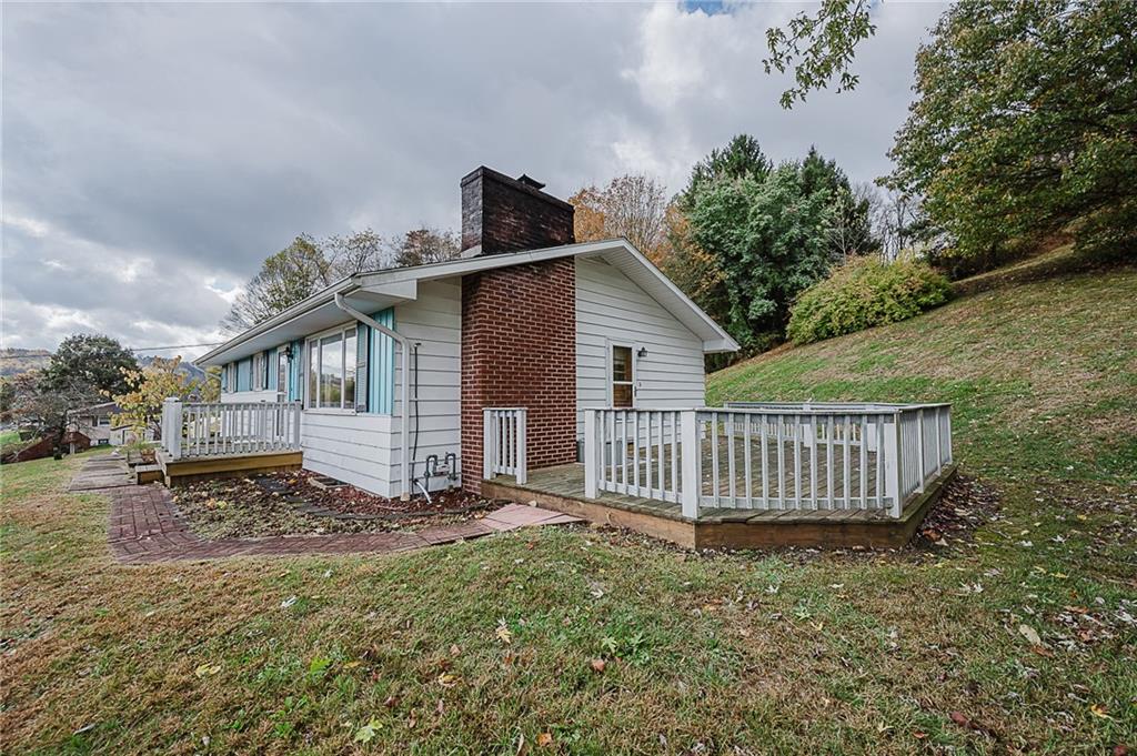 89 Marcoline Road Home, PA 15747 - Photo 43 of 47 a view of a house with a yard