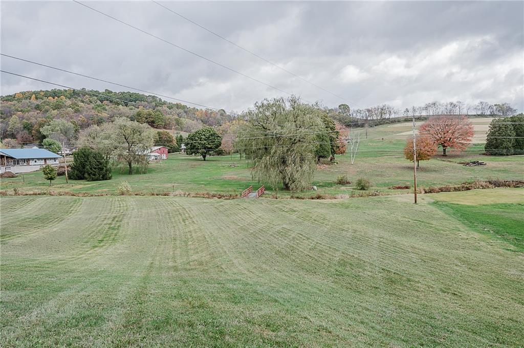 89 Marcoline Road Home, PA 15747 - Photo 47 of 47 a view of a field with an trees