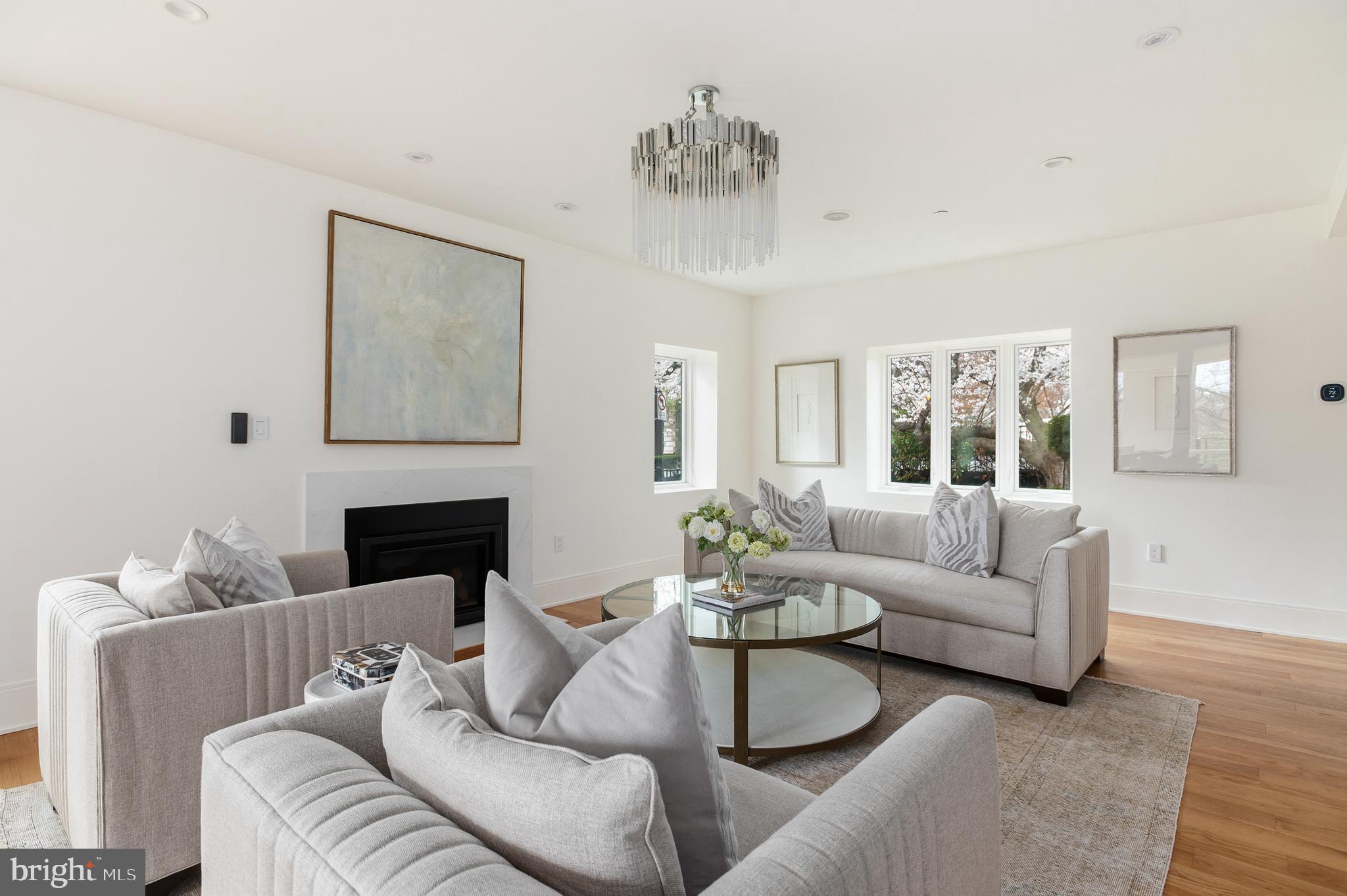 3001 Foxhall Road Northwest Washington, DC 20016 - Photo 11 of 51 a living room with furniture and a large window