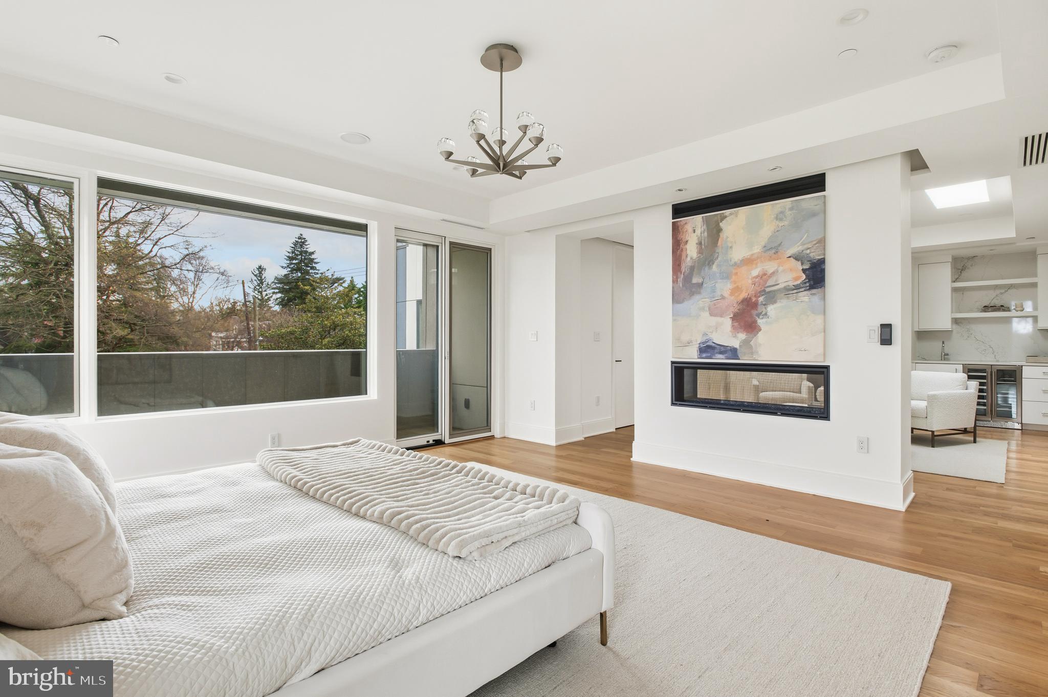 3001 Foxhall Road Northwest Washington, DC 20016 - Photo 22 of 51 a spacious bedroom with a large bed and a window