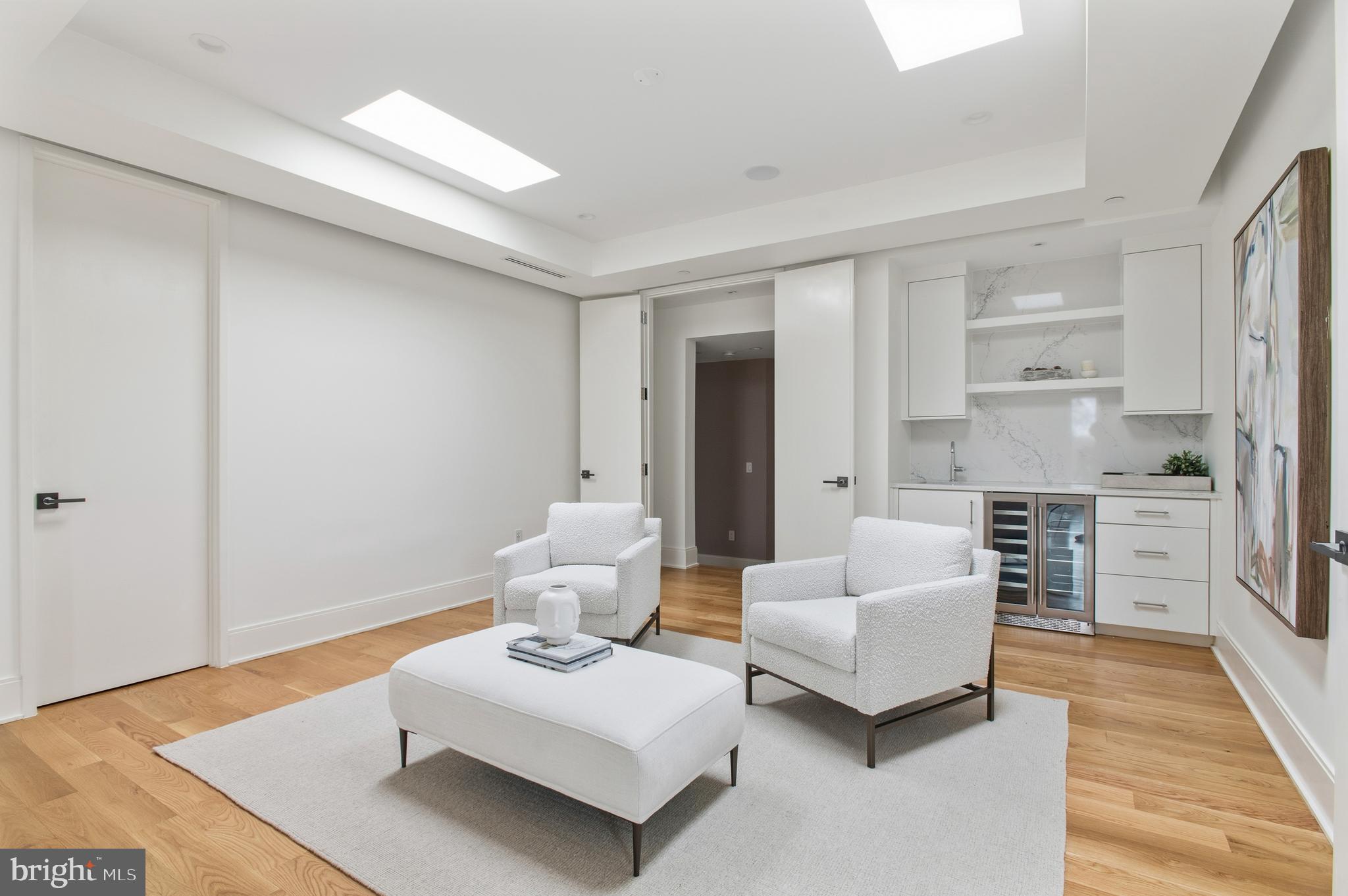 3001 Foxhall Road Northwest Washington, DC 20016 - Photo 24 of 51 a living room with furniture and wooden floor
