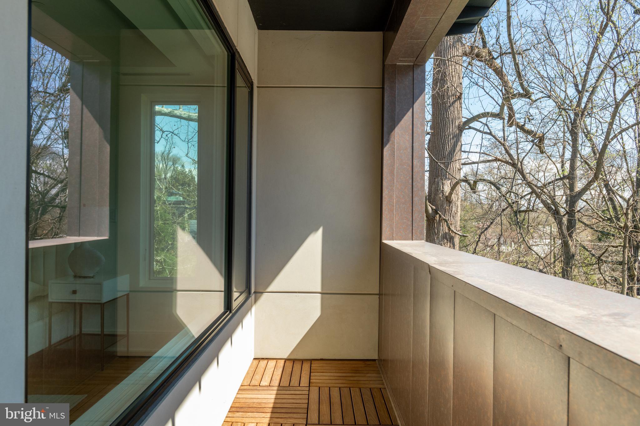 3001 Foxhall Road Northwest Washington, DC 20016 - Photo 25 of 51 a view of balcony with wooden floor