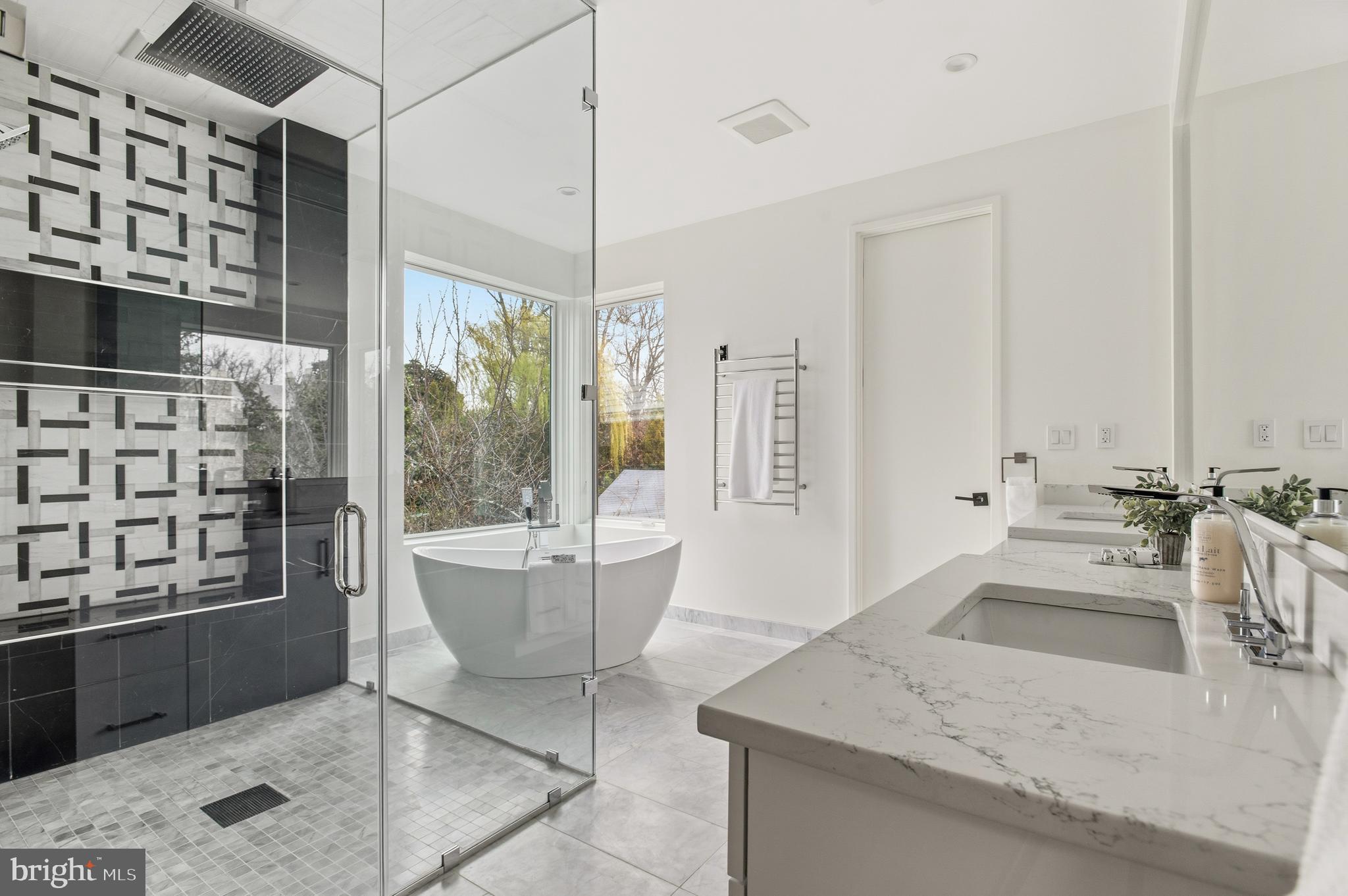 3001 Foxhall Road Northwest Washington, DC 20016 - Photo 26 of 51 a large white kitchen with a granite countertop sink and a large mirror
