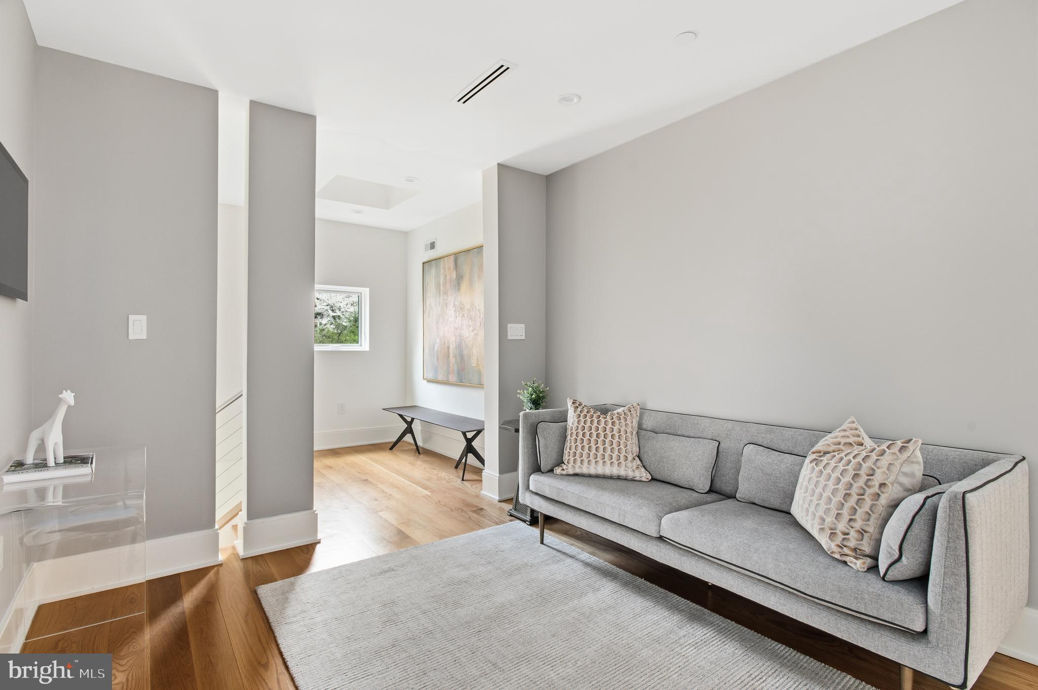 3001 Foxhall Road Northwest Washington, DC 20016 - Photo 33 of 51 a living room with furniture and a couch