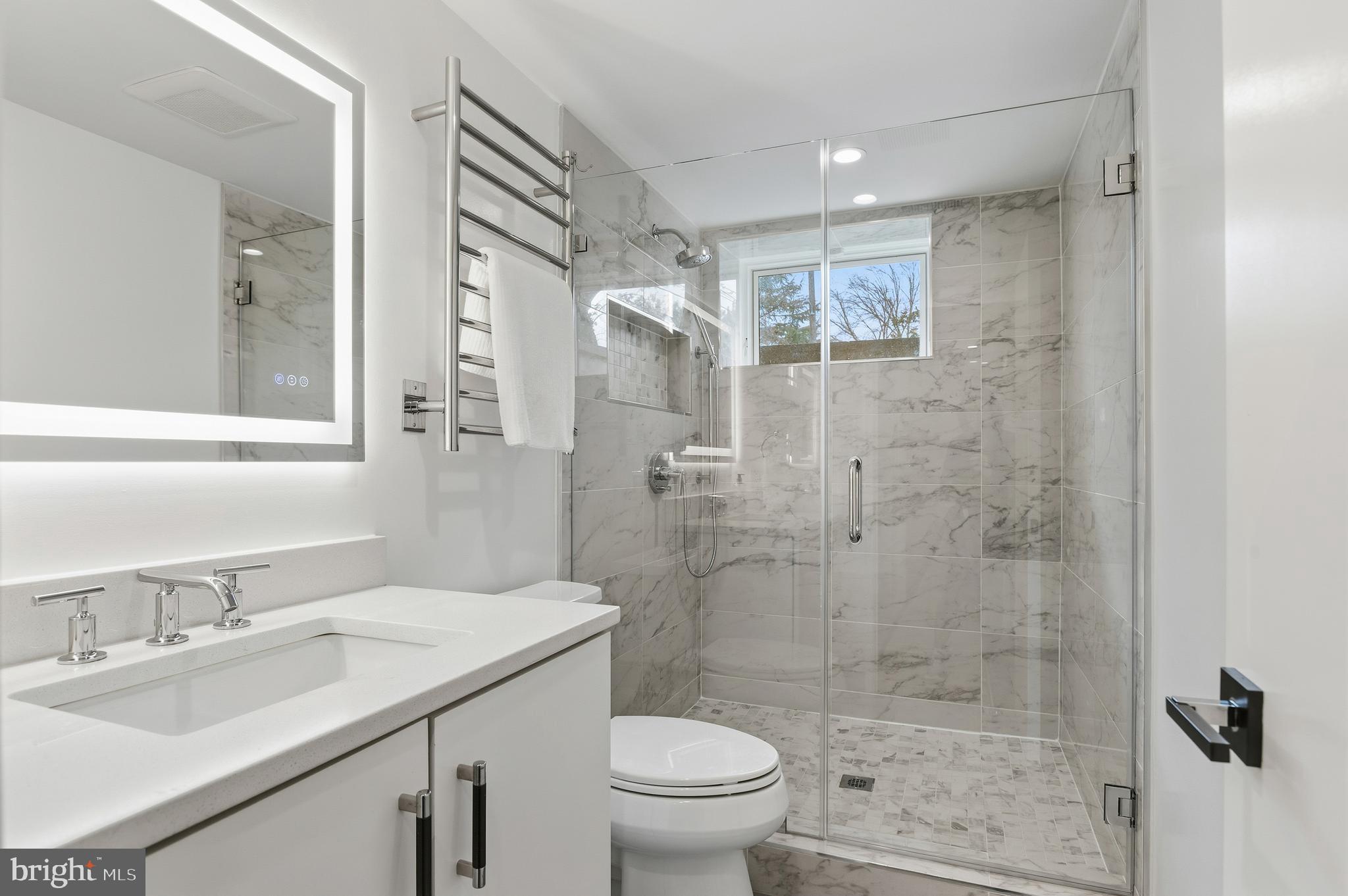 3001 Foxhall Road Northwest Washington, DC 20016 - Photo 40 of 51 a bathroom with a sink toilet and shower