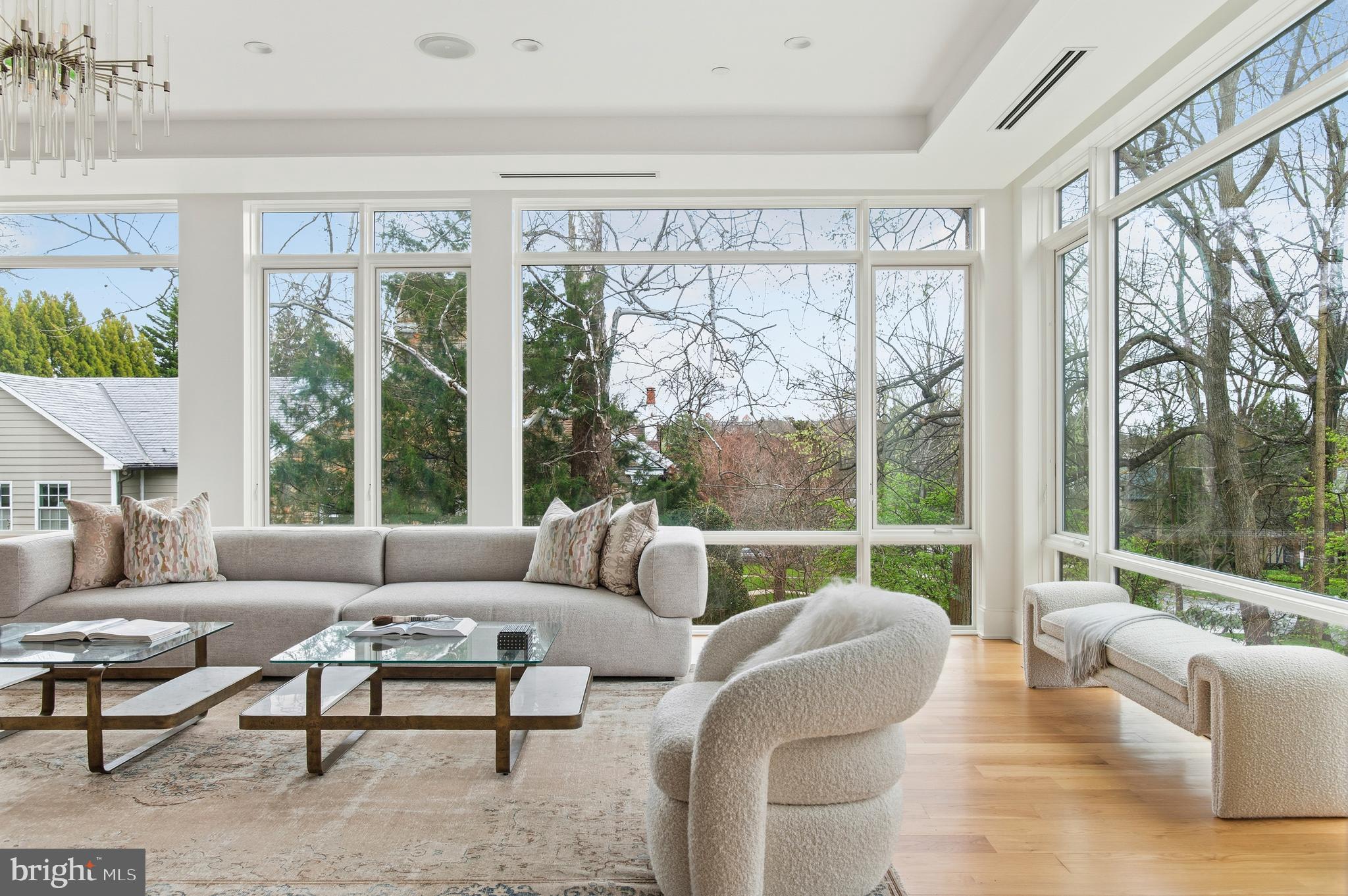 3001 Foxhall Road Northwest Washington, DC 20016 - Photo 9 of 51 a living room with furniture and a large window