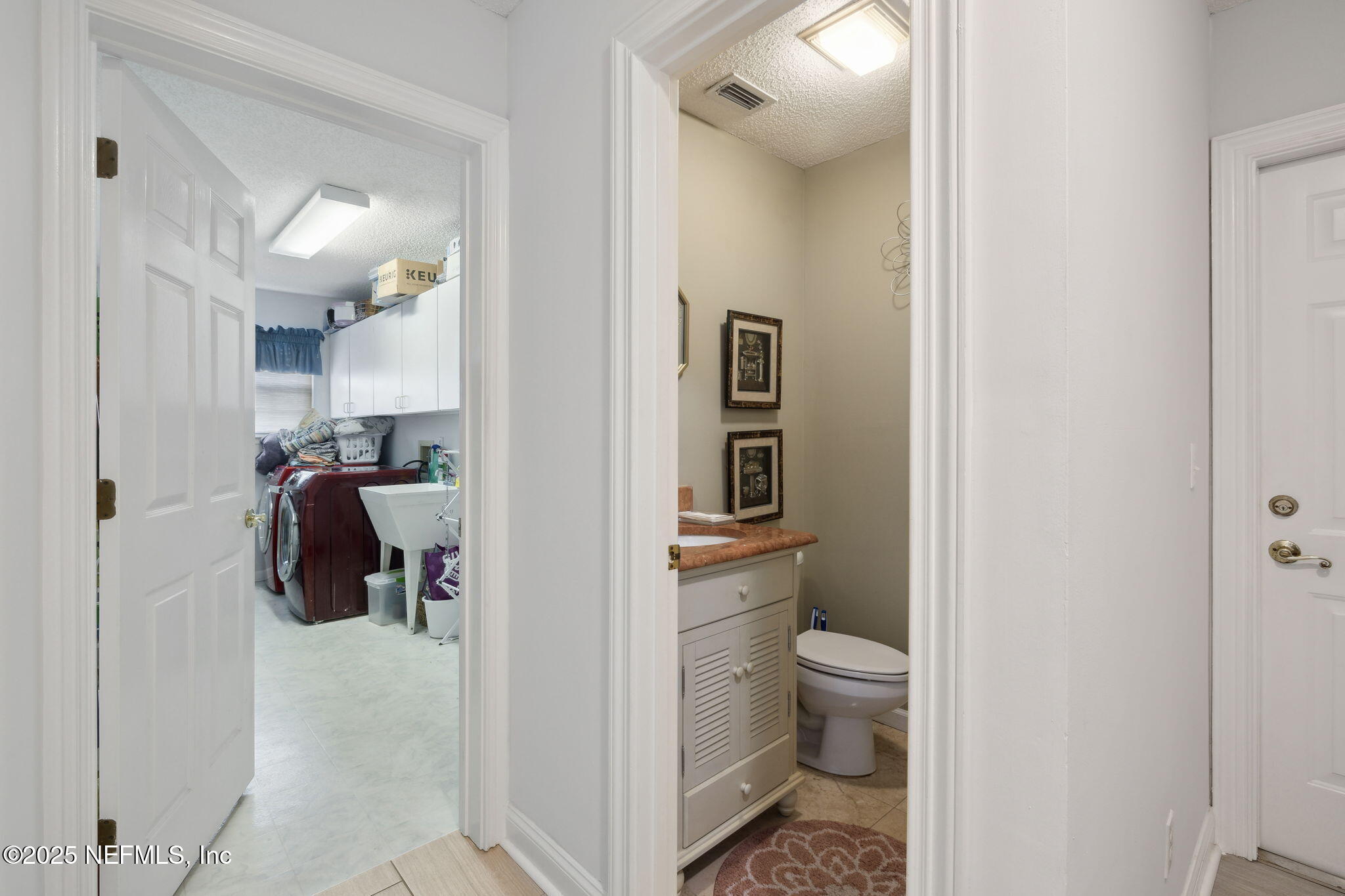 744 Cherry Grove Road Orange Park, FL 32073 - Photo 27 of 62 Half bath and laundry