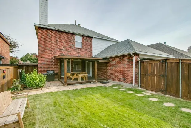 a front view of a house with patio