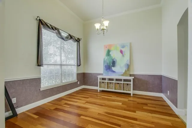 a room with a window and a table