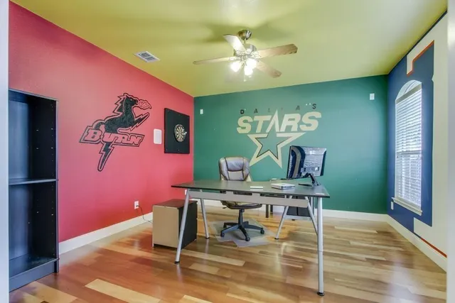 a workspace with furniture and window