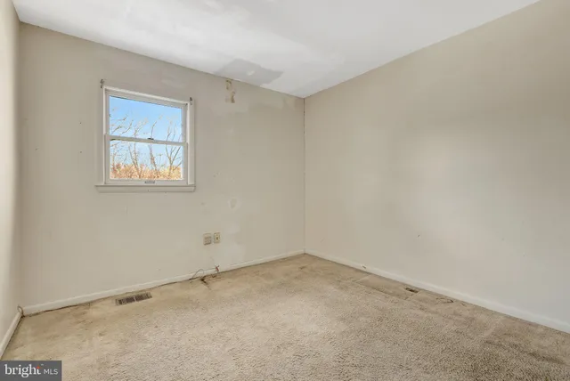 an empty room with a workbench