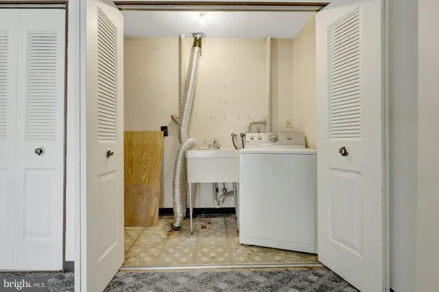 a room with a table and chairs