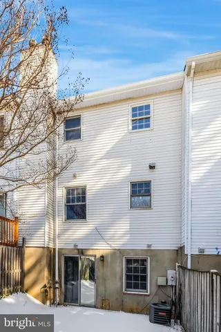 a front view of a building with glass windows